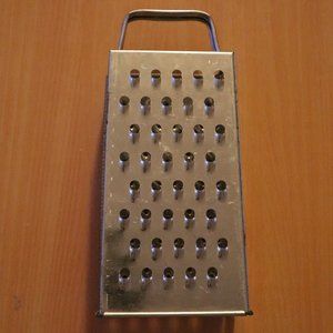 Cheese Grater Measures 8 1/2" x 4 1/2" x 3"